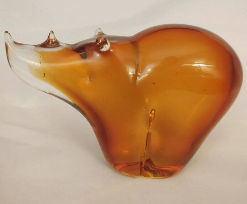 a brown glass rhino